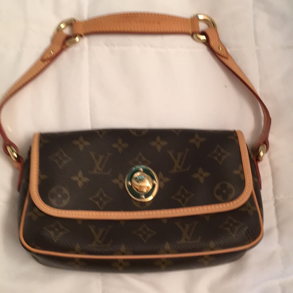 Louis Vuitton clutch style bag